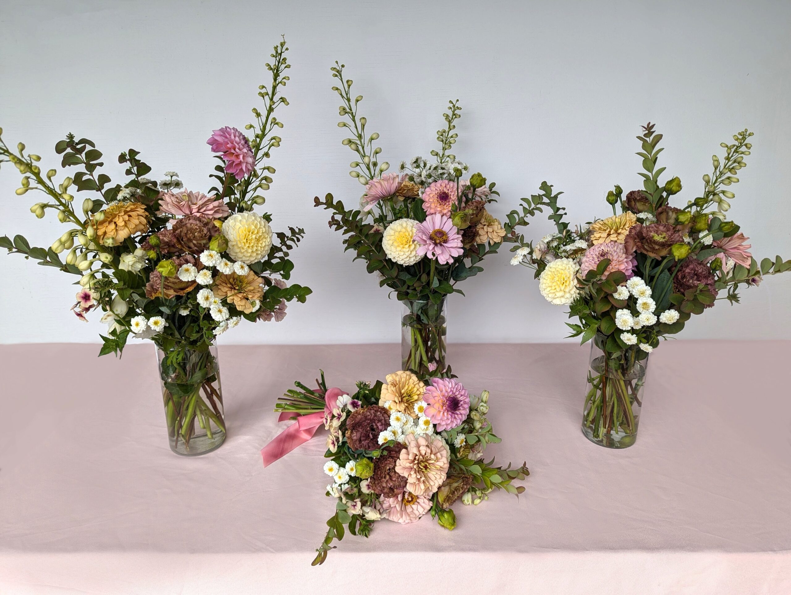 Each bucket makes about 4 small vase arrangements. You alternatively make 2 large arrangements, or 16+ bud vases